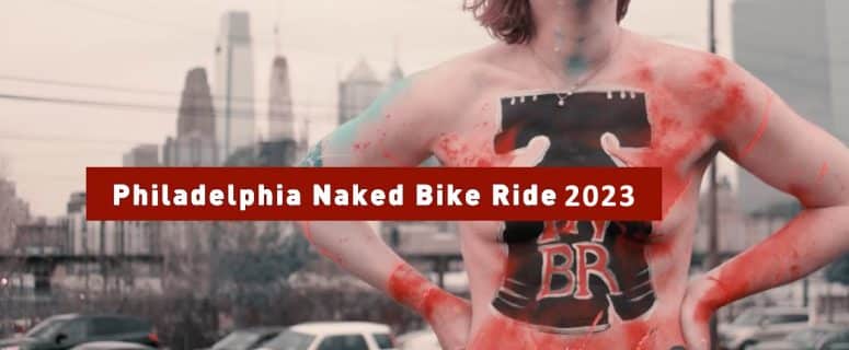 a nude woman prepares to participate in a nude bike ride