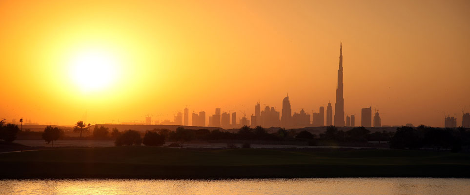 the sun setting over Dubai