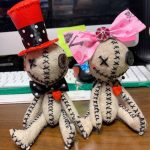 two voodoo love spell dolls