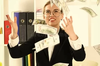 a woman surrounded by falling money